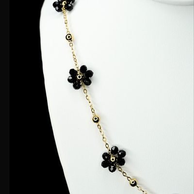 COLLIER EN OR AVEC FLEURS EN PIERRES PRÉCIEUSES NOIRES